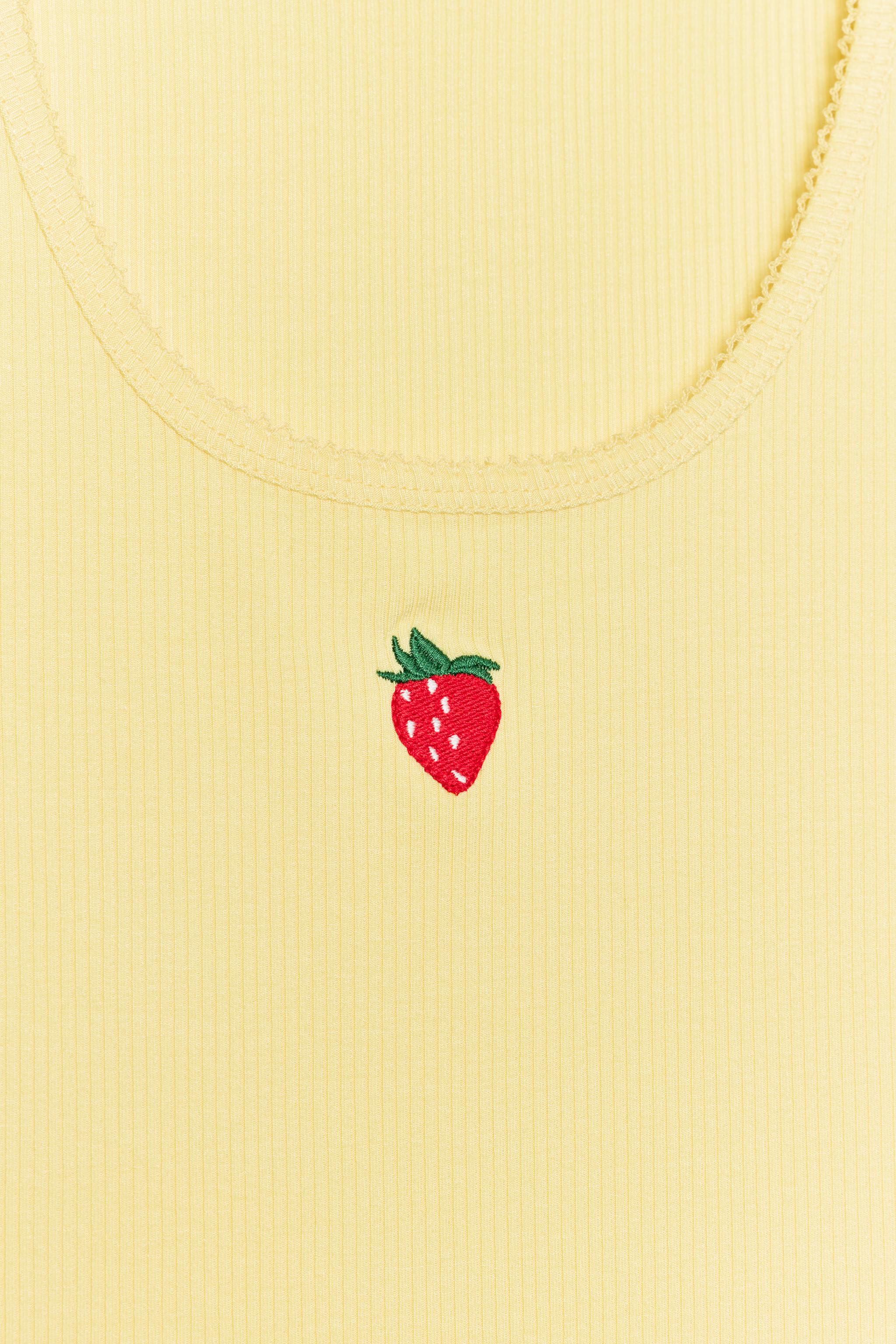 EMBROIDERED FRONT TOP